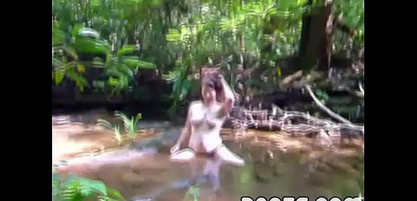  Fatty lesbian strumpet plays in water outdoor in the woods